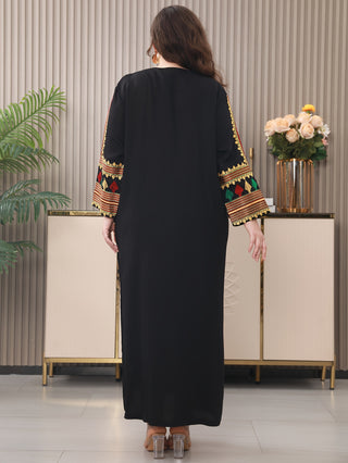 Elegant traditional black abaya with intricate embroidery - suitable for summer 